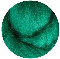 a close up of a green towel on a green surface