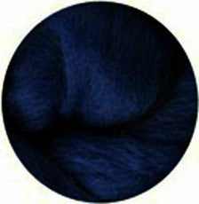 a close up of a black bowl on a table