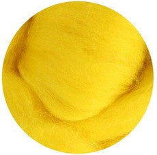 a close up of an orange on a yellow background