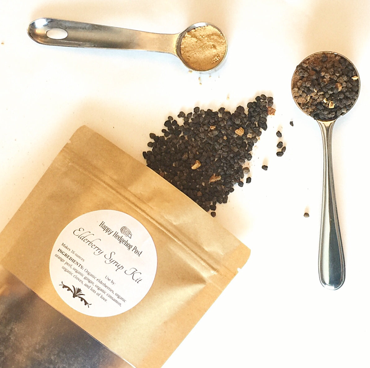 a wooden table topped with a clock and a clock